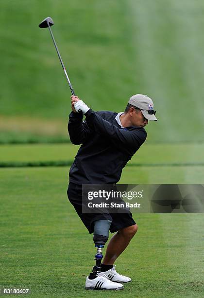 David Cook, U.S. Army, hits from the first tee during the Pro-Am round for the Constellation Energy Senior Players Championship held at Baltimore...