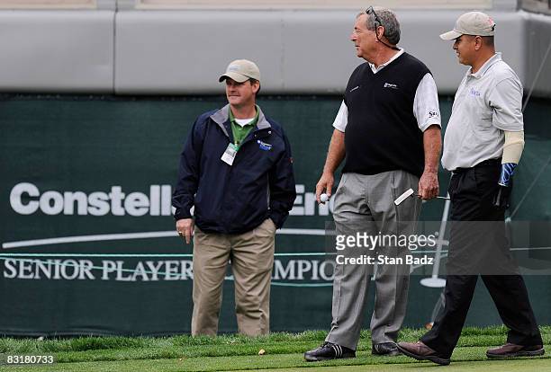 Fuzzy Zoeller watches play at the first green during the Pro-Am round for the Constellation Energy Senior Players Championship held at Baltimore...
