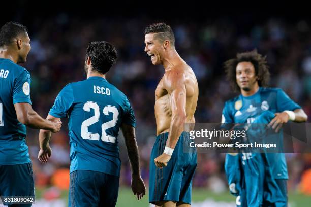 Cristiano Ronaldo of Real Madrid celebrating his goal with his teammates during the Supercopa de Espana Final 1st Leg match between FC Barcelona and...