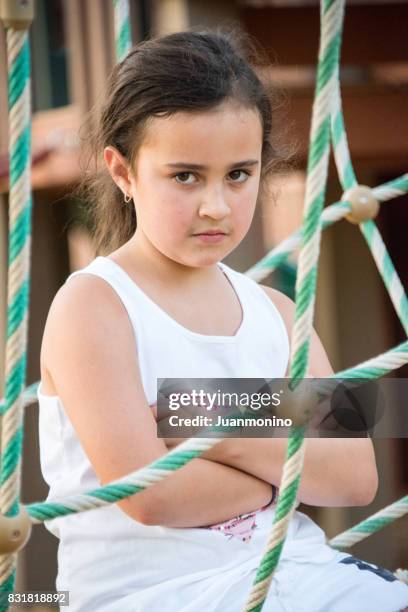 serious little girl - developmental disability stock pictures, royalty-free photos & images