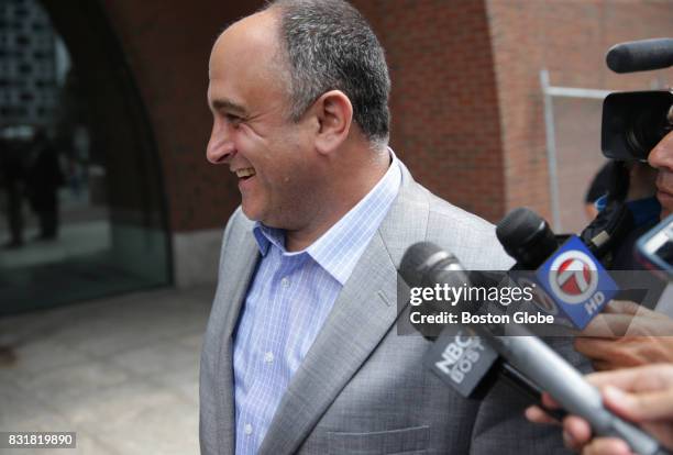 Defendant Robert Cafarelli talks with the media in front of the John Joseph Moakley Courthouse in Boston after being found not guilty of conspiracy...