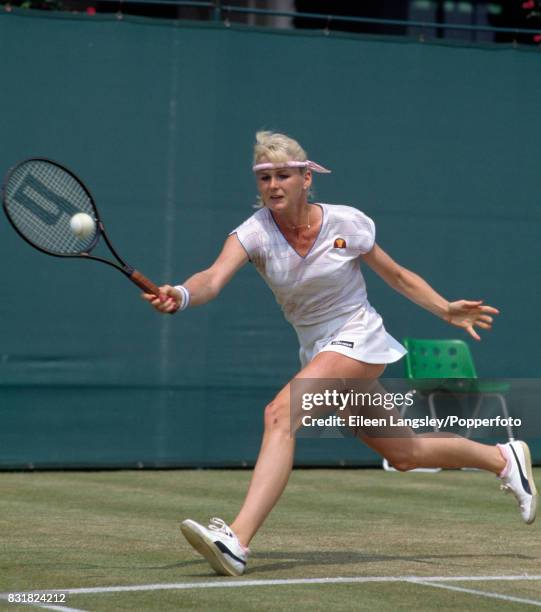 Andrea Temesvari of Hungary in action during a women's singles match at the Wimbledon Lawn Tennis Championships in London, circa June 1983. Temesvari...