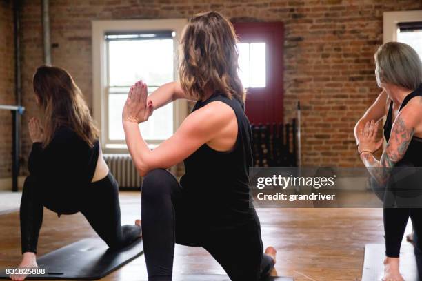 yoga-pose verdrehen - ardha matsyendrasana stock-fotos und bilder