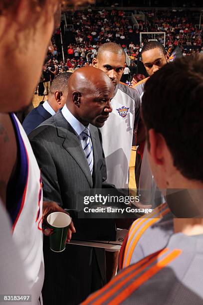 Terry Porter, head coach of the Phoenix Suns, talks with the team as the Suns host the Atlanta Hawks in an NBA game played on October 8 at U.S....