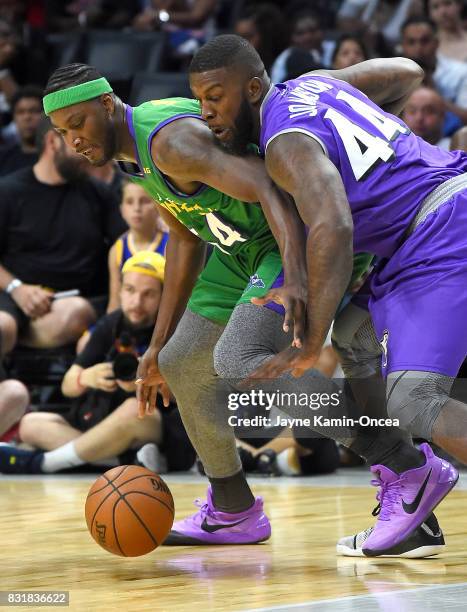 Ivan Johnson of Ghost Ballers guards Kwame Brown of the 3 Headed Monsters during the BIG3 game at Staples Center on August 13, 2017 in Los Angeles,...