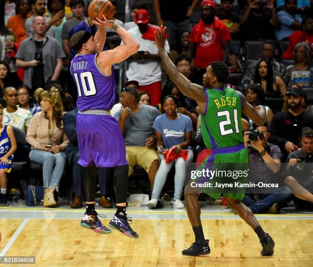 Mike Bibby of Ghost Ballers takes the winning shot over Kareem Rush of the 3 Headed Monsters at the BIG3 game at Staples Center on August 13, 2017 in...