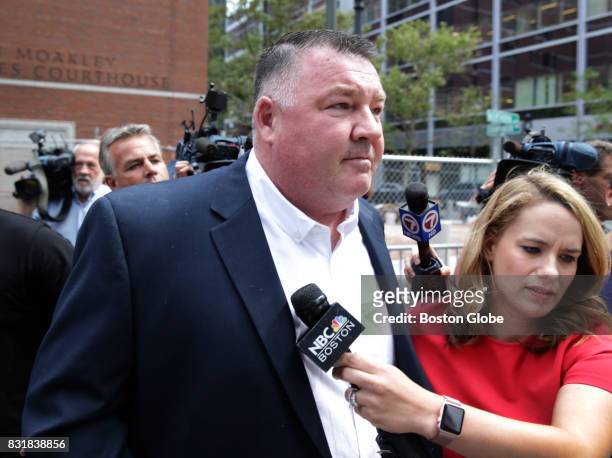 Defendant John Fidler leaves the John Joseph Moakley Courthouse in Boston after being found not guilty of conspiracy and attempted extortion on Aug....