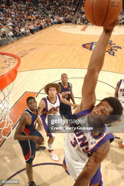 Boris Diaw of the Phoenix Suns dunks against the Atlanta Hawks in an NBA game played on October 8 at U.S. Airways Center in Phoenix, Arizona. NOTE TO...