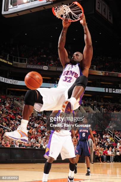 Shaquille O'Neal of the Phoenix Suns dunks against the Atlanta Hawks in an NBA game played on October 8 at U.S. Airways Center in Phoenix, Arizona....