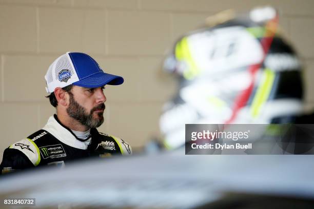 Jimmie Johnson, driver of the Lowe's Chevrolet, looks on during testing for the Monster Energy NASCAR Cup Series at Chicagoland Speedway on August...