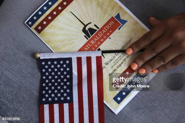 New Americans take part in a naturalization ceremony held in the observatory of the One World Trade Center on August 15, 2017 in New York City....