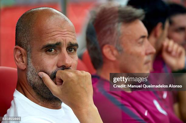 Pep Guardiola, Manager of Manchester City looks on prior to the pre-season friendly match between Girona and Manchester City at Municipal de...
