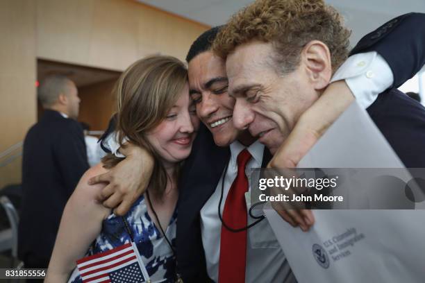 Brazilian immigrant Gleidson Hoffman , celebrates after becoming an American citizen at a naturalization ceremony held in the One World Trade Center...