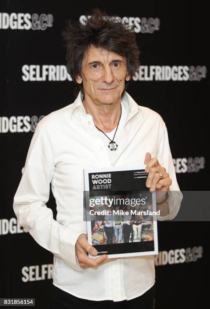 Ronnie Wood signs copies of his new book 'Ronnie Wood: Artist' at Selfridges on August 15, 2017 in London, England.