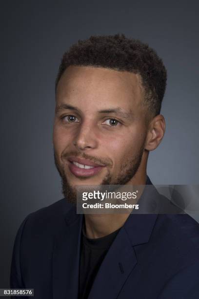 Stephen Curry, a professional basketball player with the National Basketball Association's Golden State Warriors, sits for a photograph following a...