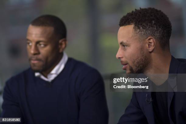 Stephen Curry, a professional basketball player with the National Basketball Association's Golden State Warriors, right, speaks during a Bloomberg...