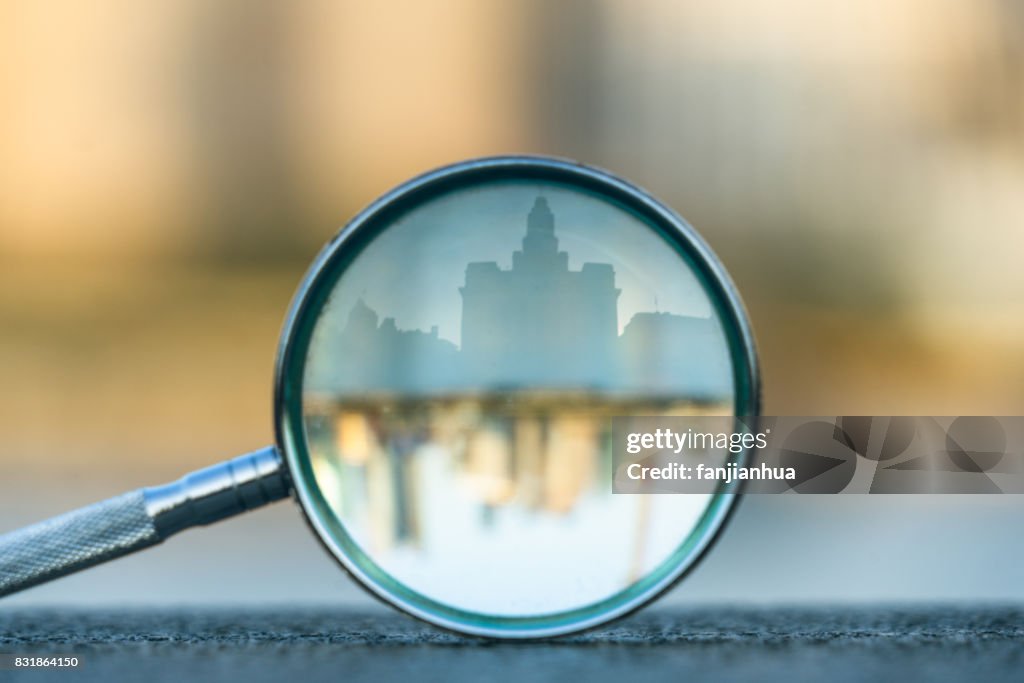 The bund of Shanghai reflected in a magnifying glass
