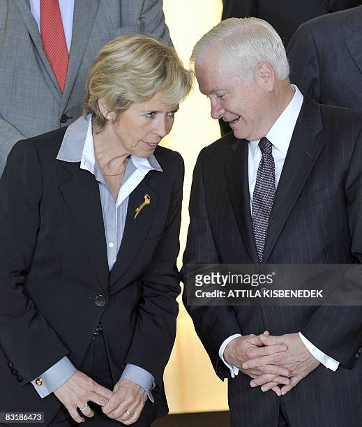 Secretary of Defence Robert Gates and Norwegian Defence Minister Anne-Grete Strom-Erichsen attend a family photo at the Marriot Hotel in downtown...