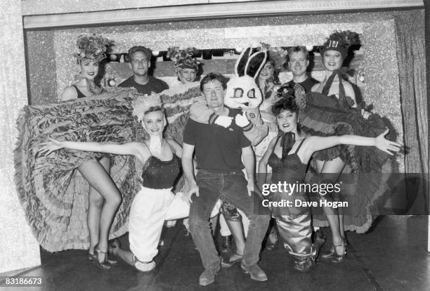 Novelty pop act Jive Bunny with the Sun newspaper's 'Bizarre' columnist, Piers Morgan , and showgirls in Paris, circa 1989.