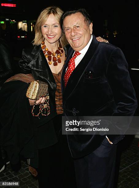 Actor Barry Humphries and Lizzie Spender arrives for the opening night of the music production of 'My Fair Lady' at the Theatre Royal on October 9,...