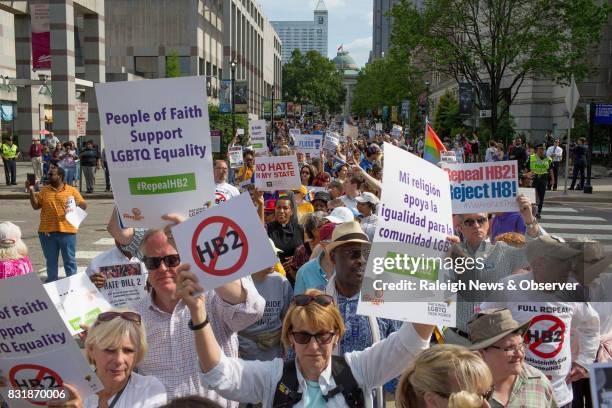 Demonstrators call for the repeal of HB2 in Raleigh, N.C., on April 25, 2016. North Carolina is among six states that some employees have been banned...