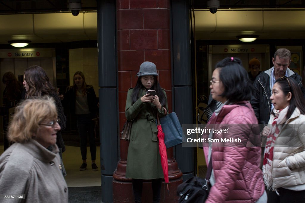 People Looking At Their Mobile Phones