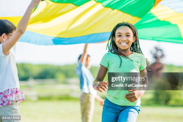 running under parachute - farm bailout stock pictures, royalty-free photos & images