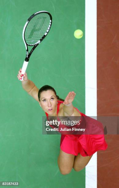 Jelena Jankovic of Serbia serves to Vera Dushevina of Russia during day four of the Kremlin Cup Tennis at the Olympic Stadium on October 9, 2008 in...