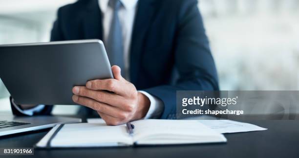 productivity is in his hands - man hand ipad stock pictures, royalty-free photos & images