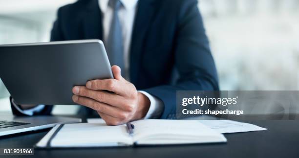 productivity is in his hands - ipad close up imagens e fotografias de stock