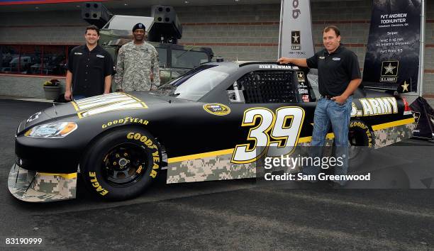 Team owner of Stewart-Haas Racing Tony Stewart , Major General Montague Winfield , and Ryan Newman , driver of the U.S. Army Chevorlet for the 2009...