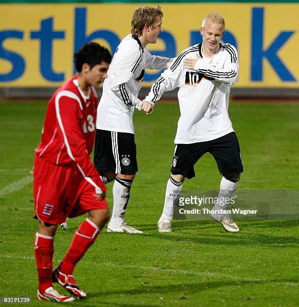 Sascha Bigalke of Germany celebrates after scoring to 1:0 with a teammate during the U19 Euro 2009 Qualification at the Moselstadium on October 9,...