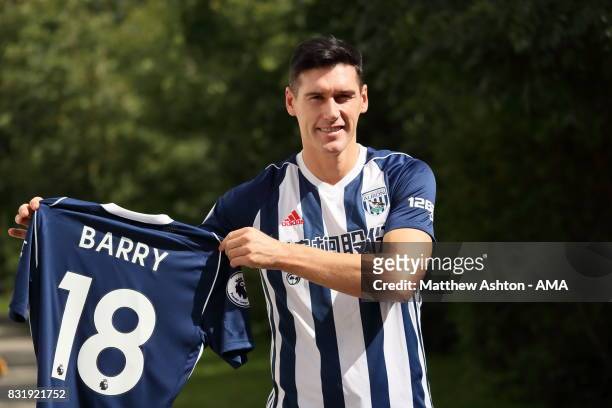 Gareth Barry signs for West Bromwich Albion on August 15, 2017 in West Bromwich, England.
