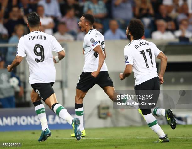 Trent Alexander-Arnold of Liverpool scores from a free kick during the UEFA Champions League Qualifying Play-Offs Round First Leg match between 1899...