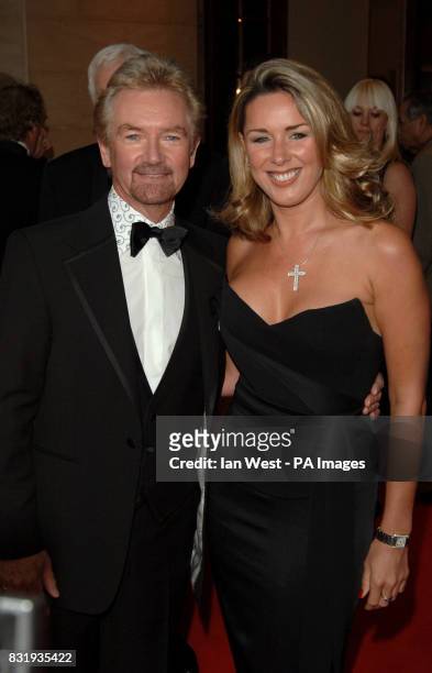 Noel Edmonds and Claire Sweeney arrive for the TV Baftas, at the Grosvenor House Hotel in central London.