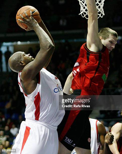Marc Johnson of Olympiacos Piraeus and Lucho Fernandez of TAU in action during the Euroleague Basketball Game 8 between Tau Ceramica v Olympiacos...
