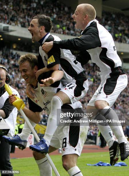 Gretna's Ryan McGuffie celebrates scoring against Hearts during the Tennents Scottish Cup final at Hampden Park, Glasgow.