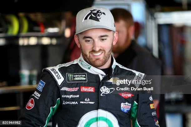 Austin Dillon, driver of the Dow STEM Chevrolet, looks on during testing for the Monster Energy NASCAR Cup Series at Chicagoland Speedway on August...