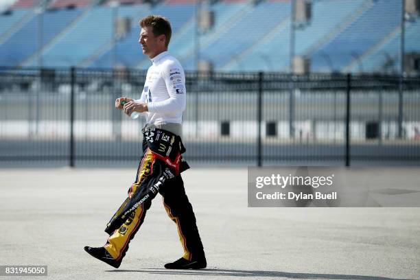 Jamie McMurray, driver of the McDonalds/Cessna Chevrolet, walks to the garage during testing for the Monster Energy NASCAR Cup Series at Chicagoland...