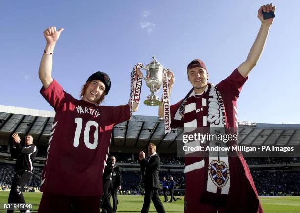 Hearts Rudi Skacel and Michal Popisil celebrate with the trophy after the Tennents Scottish Cup final against Gretna at Hampden Park, Glasgow.