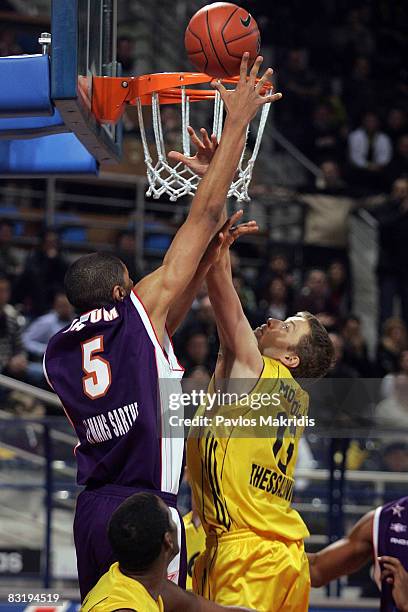 Hanno Mottola number 13 of Aris TT Bank and Nicolas Batum number 5 of Le Mans in action during the Euroleague Basketball Game 9 between Aris TT Bank...