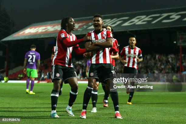 Ollie Watkins of Brentford celebrates after scoring his sides first goal during the Sky Bet Championship match between Brentford and Bristol City at...