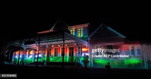 Members of the public take part in celebrating India's 70th Independence Anniversary at the Pietermaritzburg Railway Station in Pietermaritzburg on...