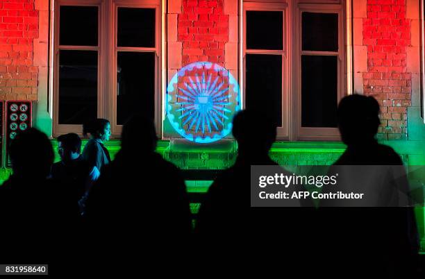 Members of the public take part in celebrating India's 70th Independence Anniversary at the Pietermaritzburg Railway Station in Pietermaritzburg on...