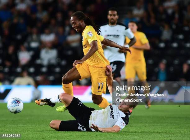 Preston North End's Daniel Johnson is tackled by Derby County's Matej Vydra during the Sky Bet Championship match between Derby County and Preston...
