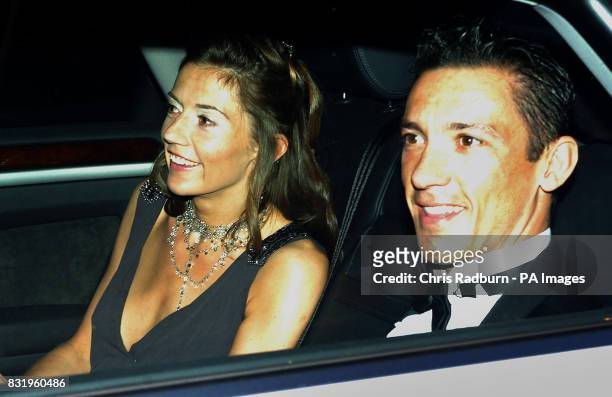 Frankie Dettori and his wife Catherine arrive at the Hertfordshire home of England captain David Beckham and his wife Victoria for their pre-World...