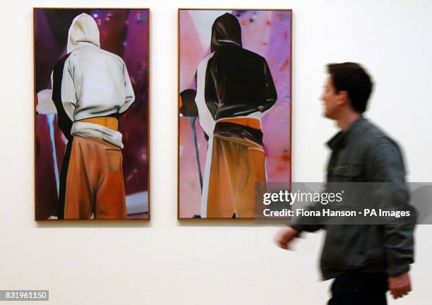Eberhard Havekost's Ghost 1 and Ghost 2 paintings based on a photograph of the rap musician Eminem now exhibiting at the Tate Modern in London, which...