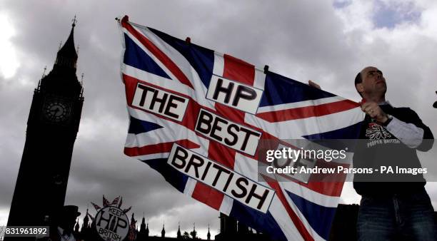 Micky Malone, deputy shop steward at the HP factory in Birmingham, outside Parliament Square in central London where protesters were opposing the...