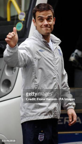Robbie Williams leaves with the England Soccer Aid team after a reception at No. 10 Downing Street, London.