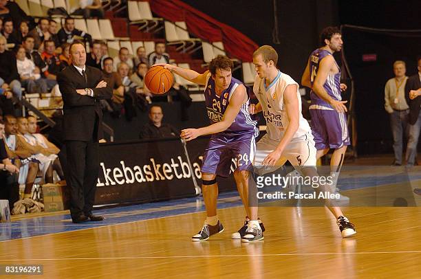 Jean-Denys CHOULET ROANNE, 24 Raul LOPEZ REAL MADRID, 5 Pierrick POUPET ROANNE in action during the Euroleague Basketball Game 13 between Chorale...